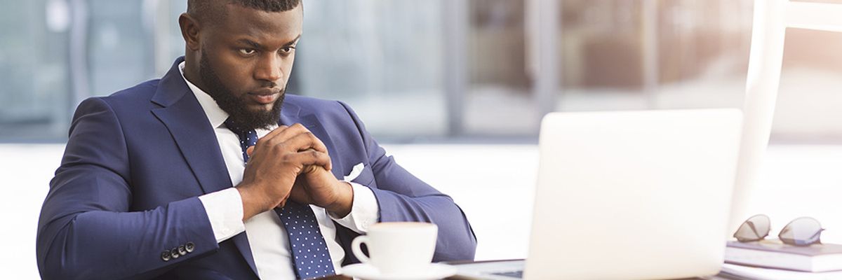 A businessman ponders his career.