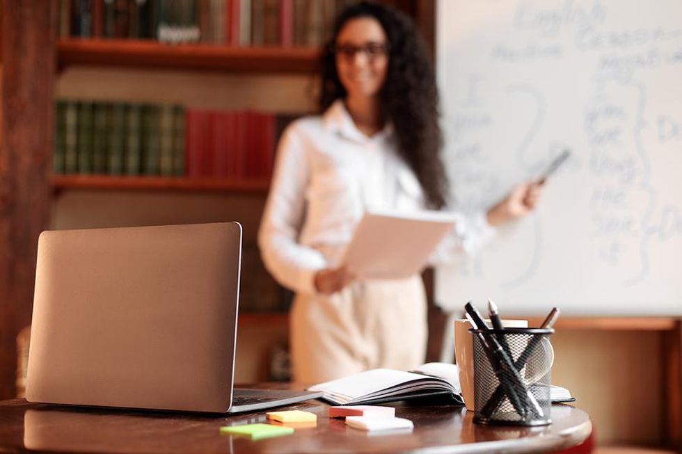 A Businesswoman records a presentation.