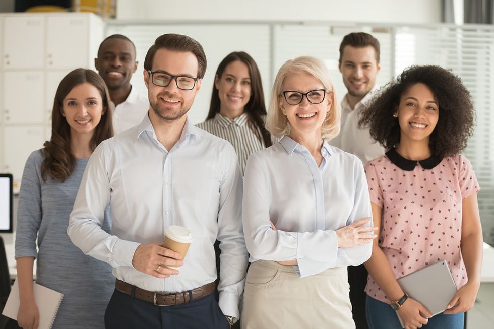 A group of leaders using their personal leadership skills at the office.