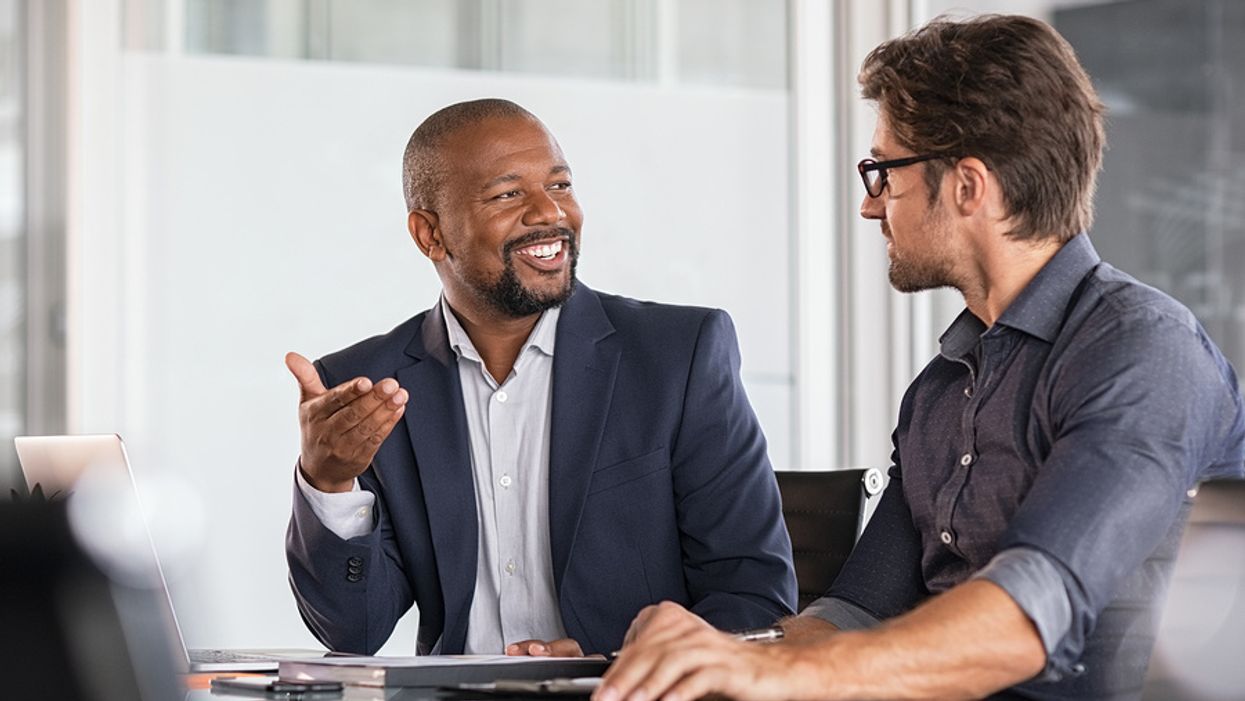 A hiring manager has a casual conversation with a job seeker during an interview