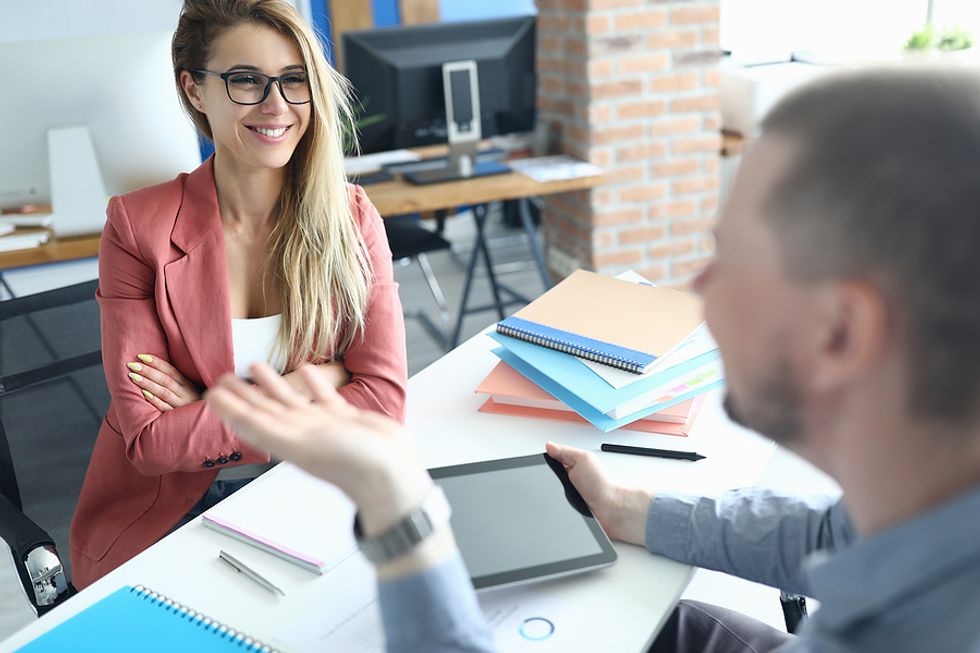 A job seeker answers questions during an interview