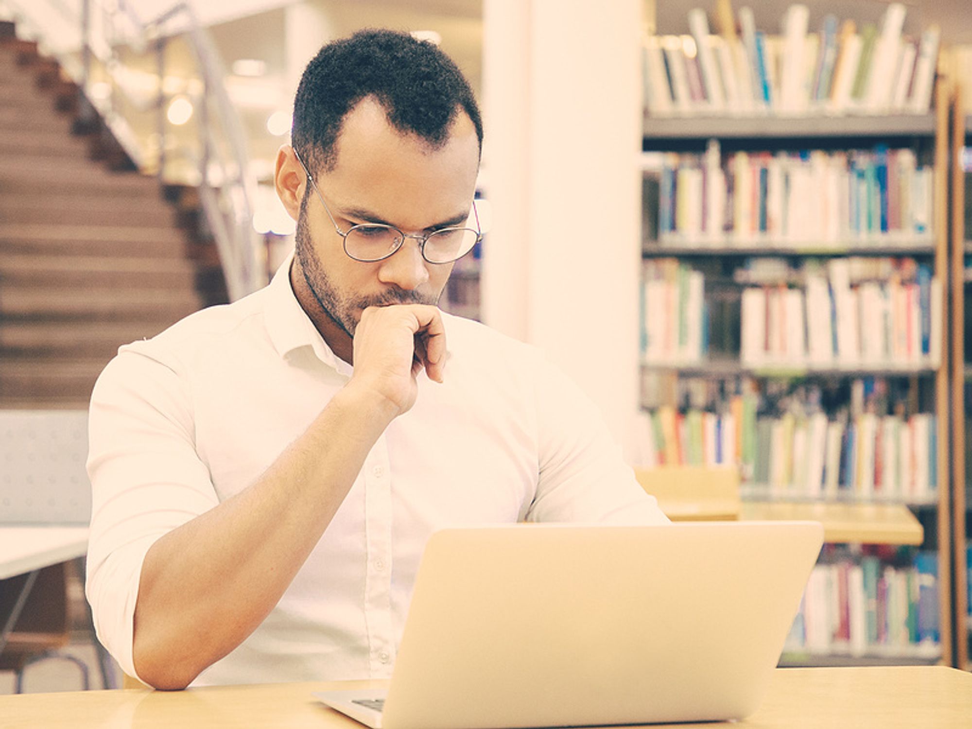 A job seeker does his research on a company he wants to apply to.