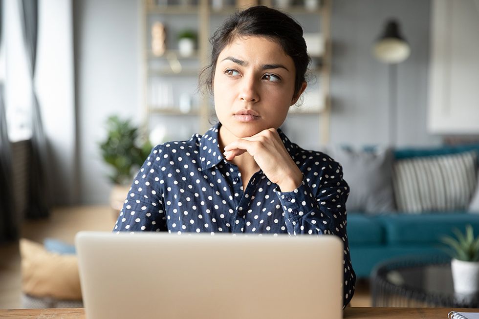 A job seeker thinks about her career goals.