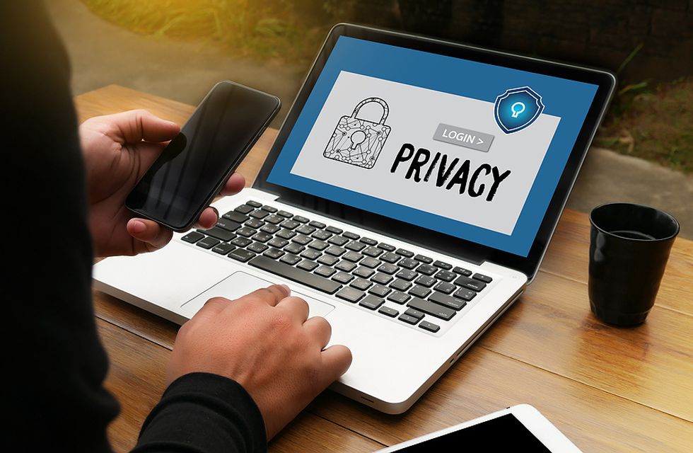 A professional adjusts their privacy settings on LinkedIn.