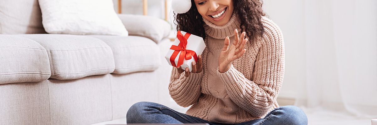 A remote worker takes part in a virtual holiday party.