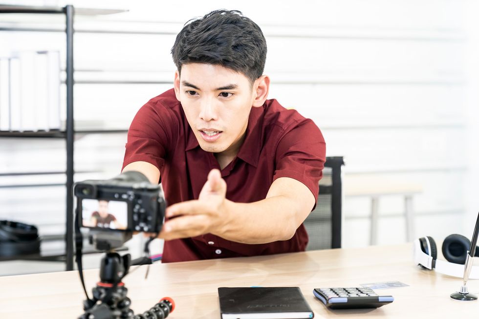 A student works on creating a video journal.