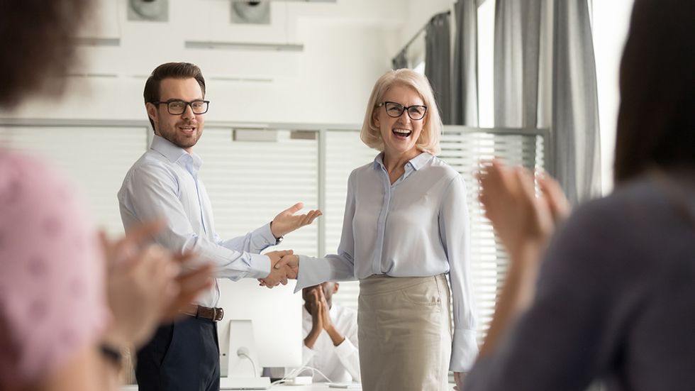 A woman is promoted to manager for her leadership characteristics