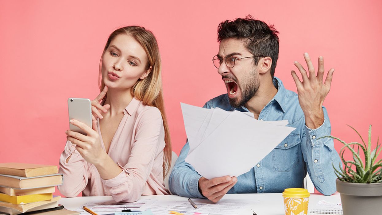 Annoying, terrible coworker uses her phone at work