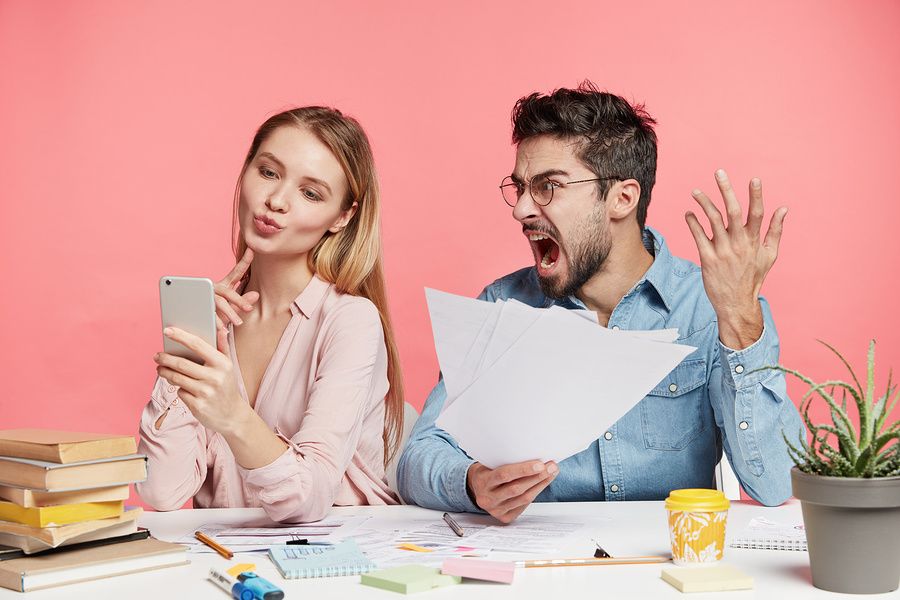 Annoying, terrible coworker uses her phone at work