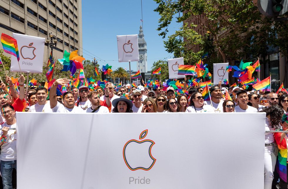 Apple employees take part in the 2019 Pride Parade.