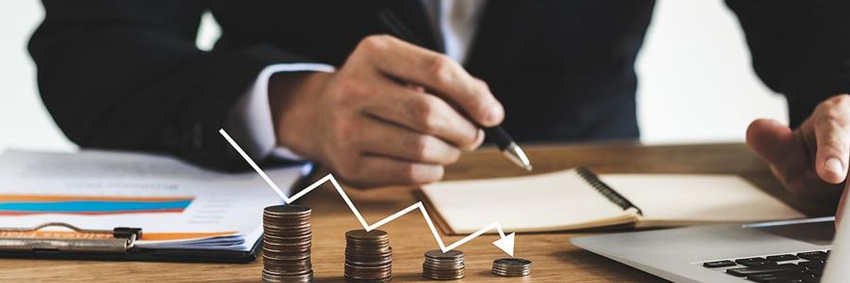 Business executive deals with recession, economic downturn, losing money
