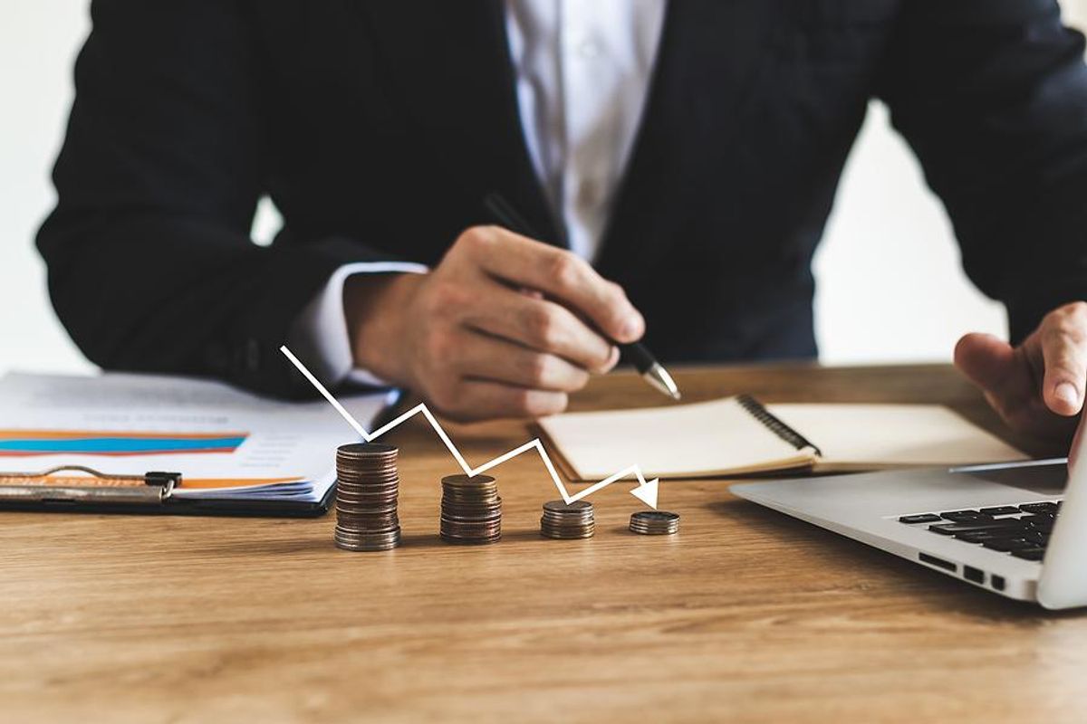 Business executive deals with recession, economic downturn, losing money
