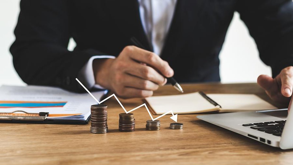 Business executive deals with recession, economic downturn, losing money