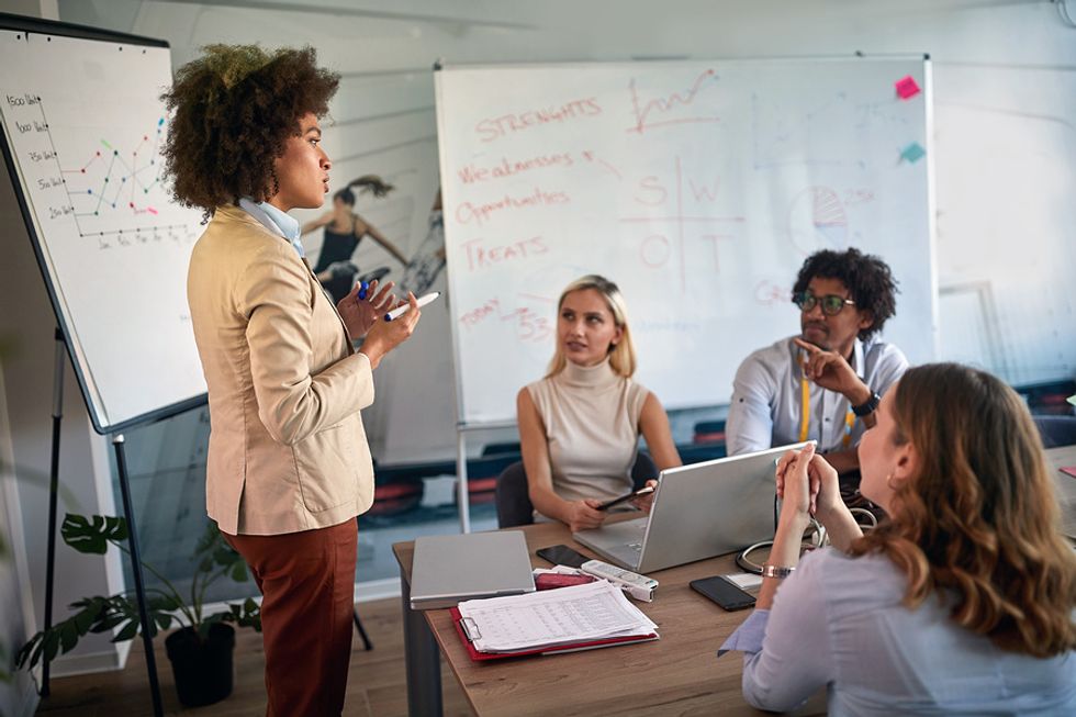 Business leader is adaptive instead of tactical during a work meeting