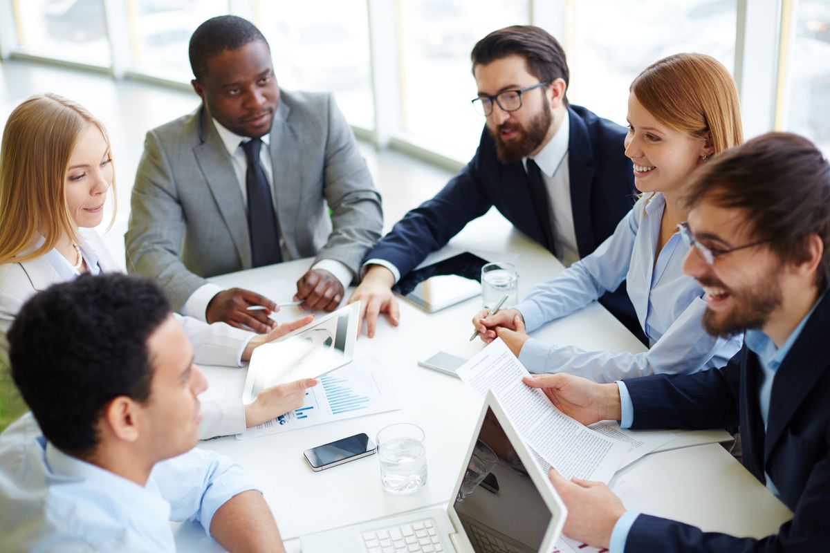 Business people communicate during a work meeting