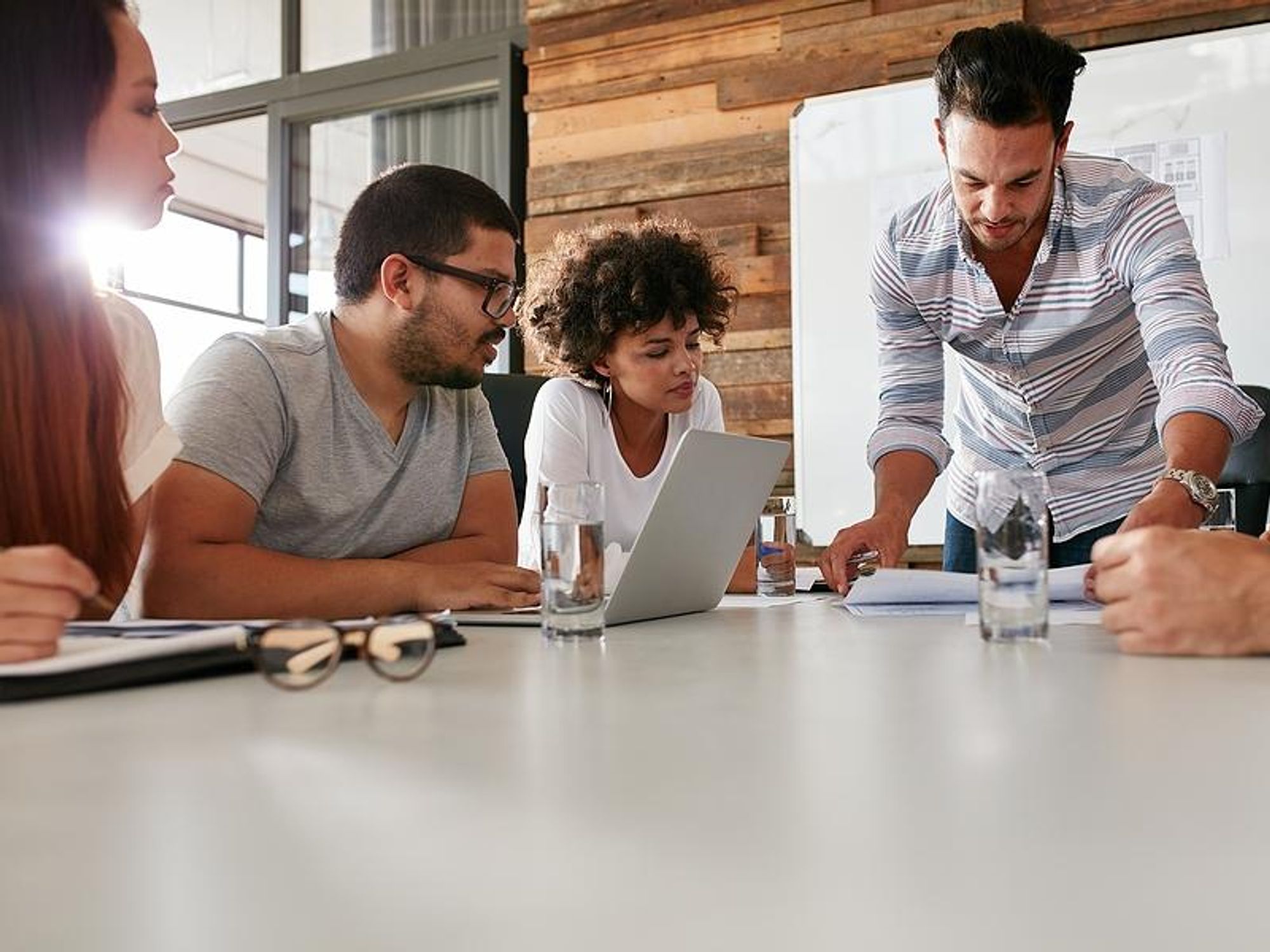 Business people discuss risk management during a work meeting