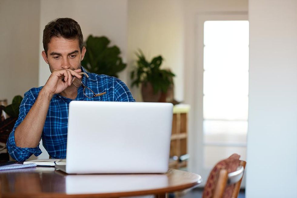 Business professional gives deep thought to his career choices.