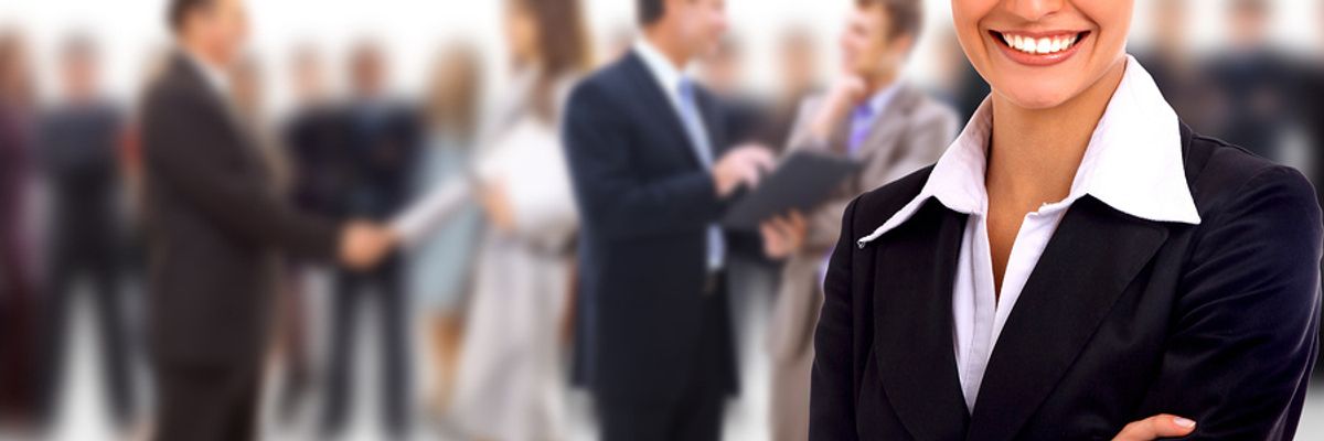 Business woman smiling because she's in a fast-growing and high-paying career.