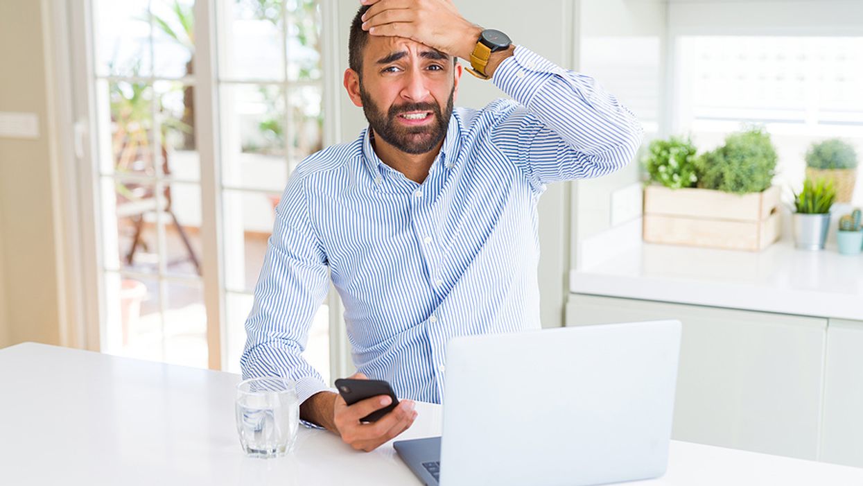 Businessman is stressed out after falling victim to a fake job posting scam