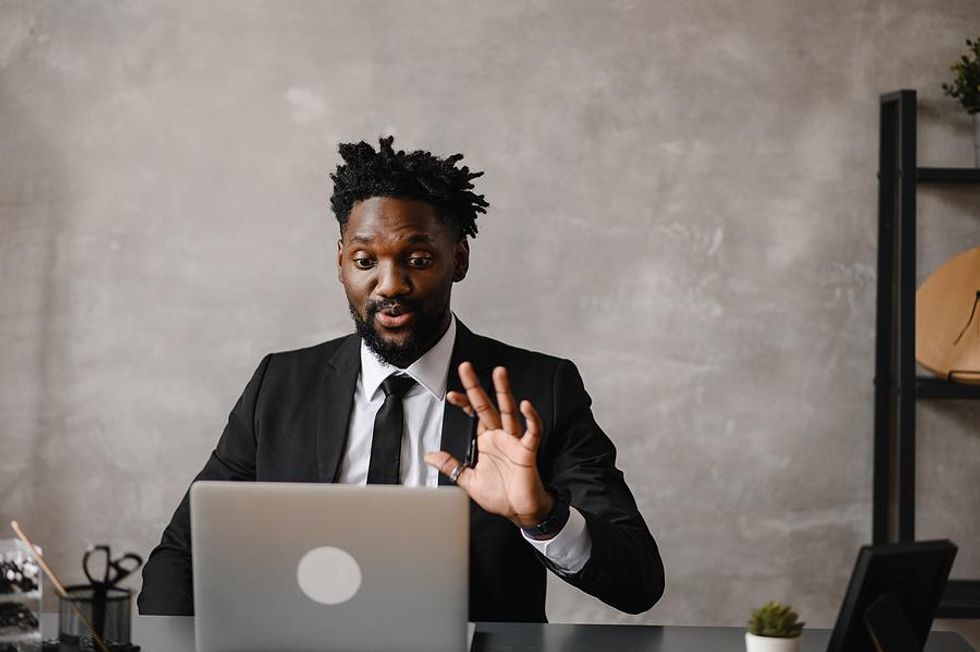 Businessman takes part in video job interview.