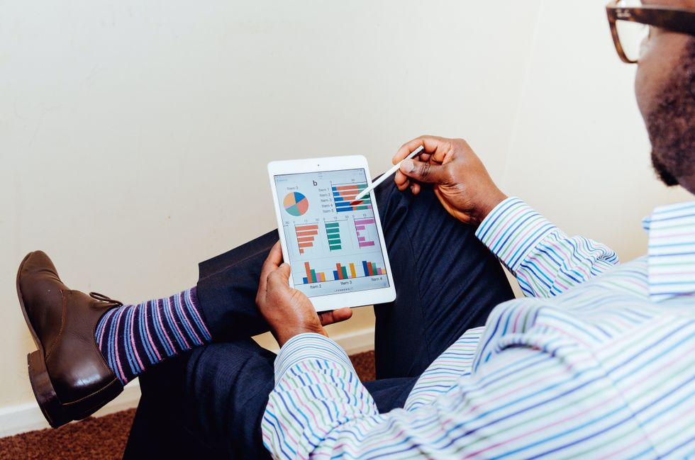 Businessman uses data to help make a decision.