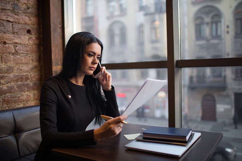 Businesswoman makes a series of networking calls