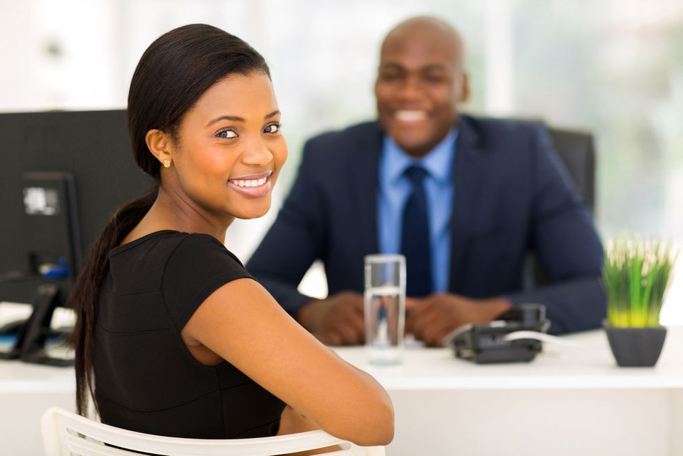 Businesswoman remains positive during a job interview.