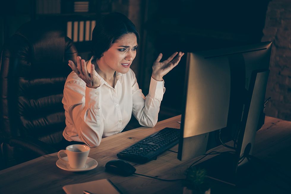 Businesswoman shows frustration with being passed over for a promotion.