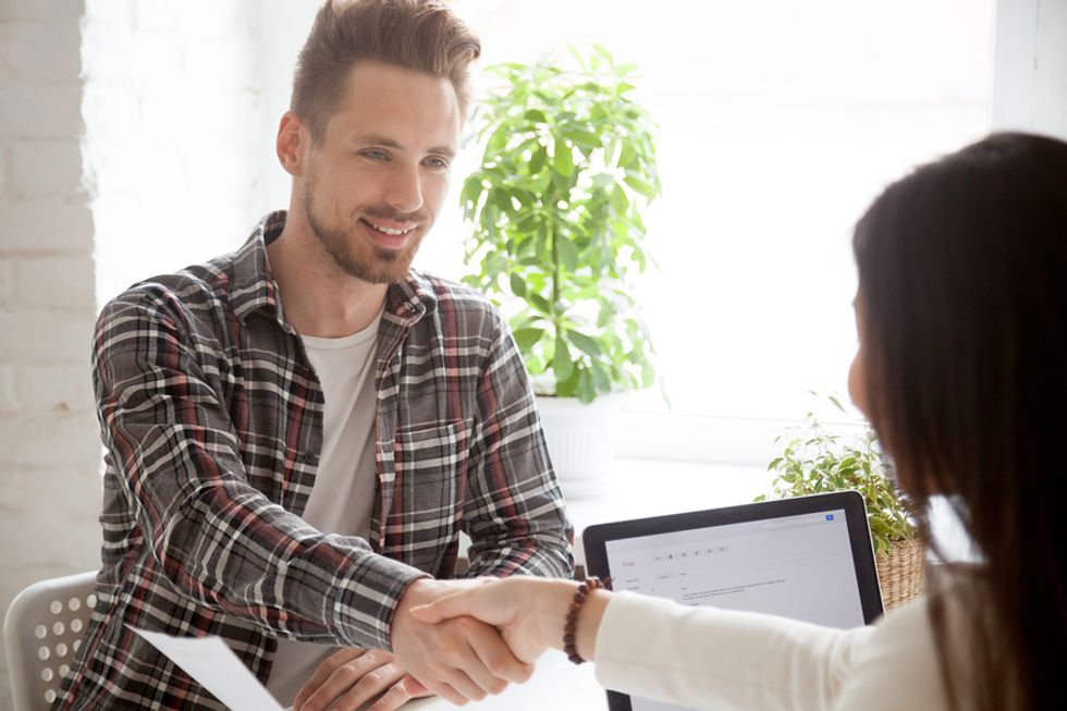 College student interviews for a summer internship position