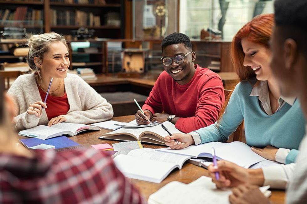 College students study together in the library