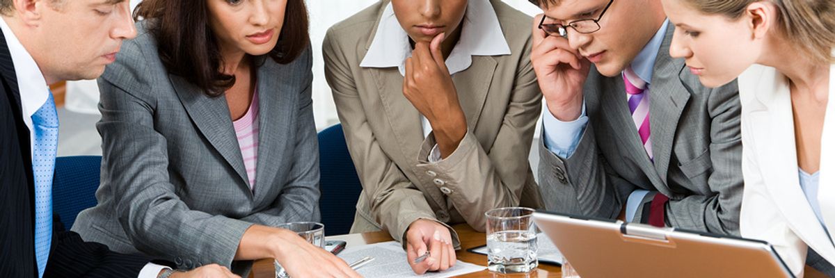 Concerned co-workers gather to discuss mistakes being made in the company's employer branding strategies.