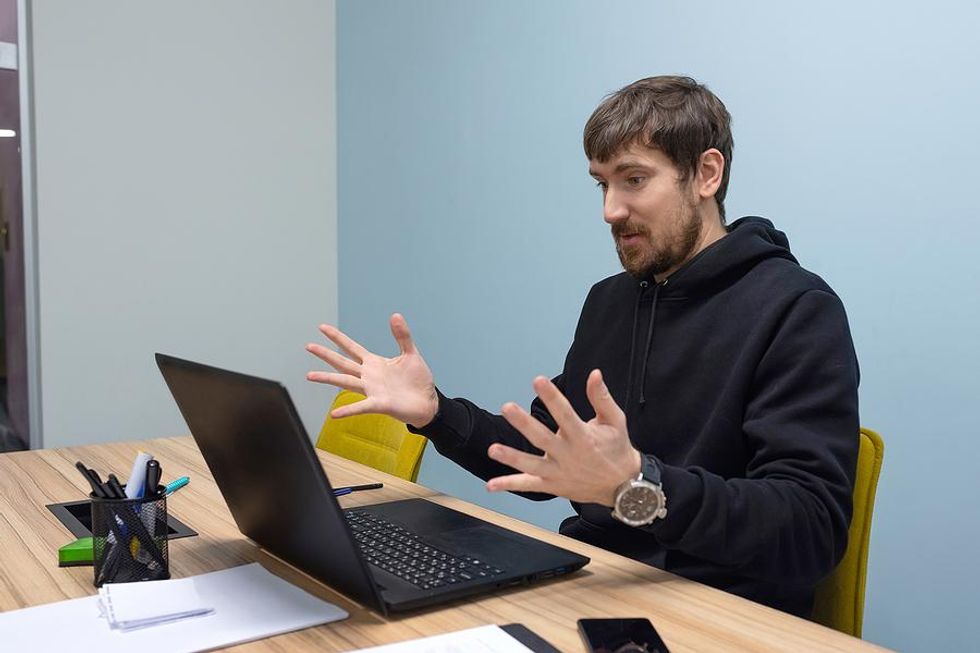 Confused and frustrated man not sure if a job posting is fake or not