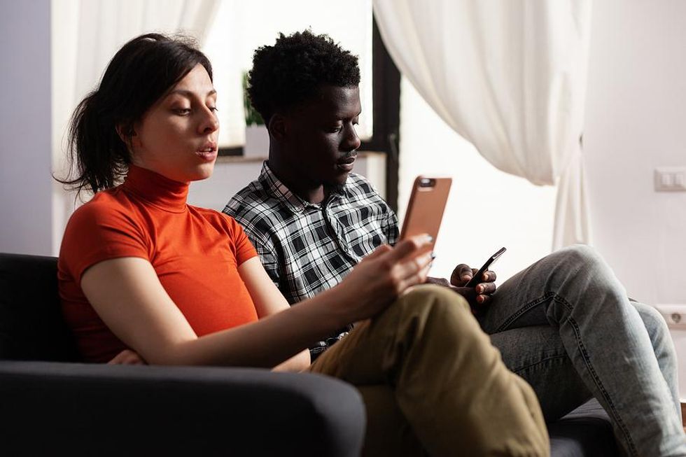 Couple gets distracted by their phones