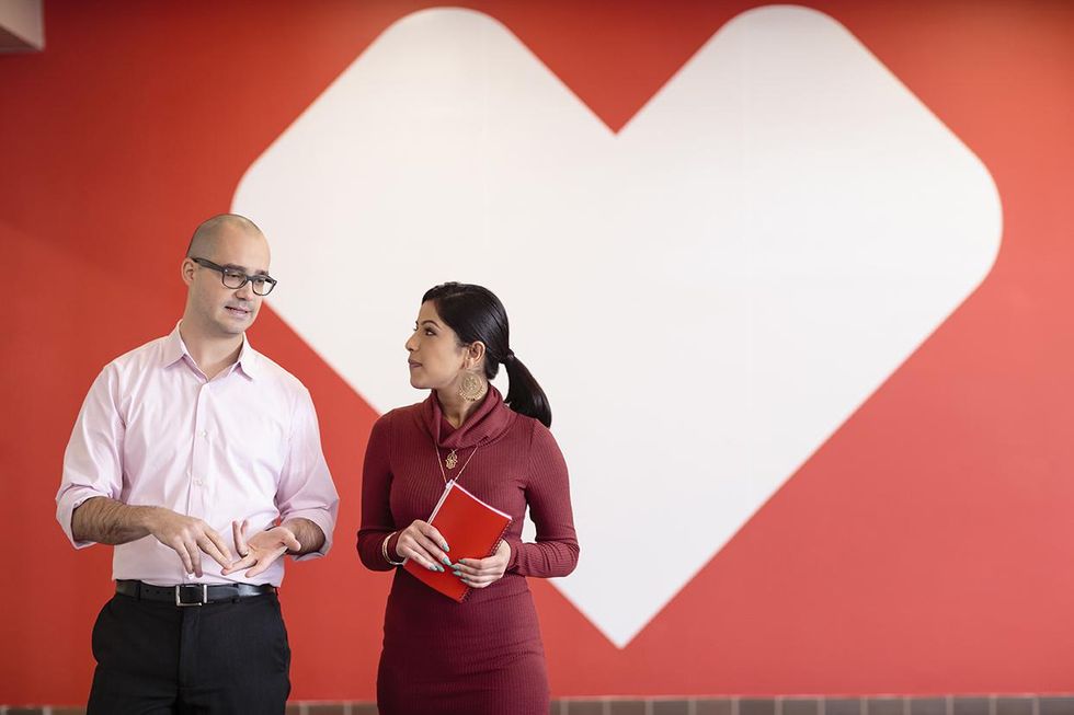 Coworkers chat at CVS Health offices.