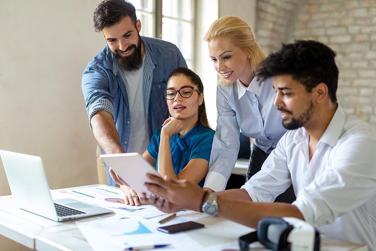 Coworkers collaborate on a work project