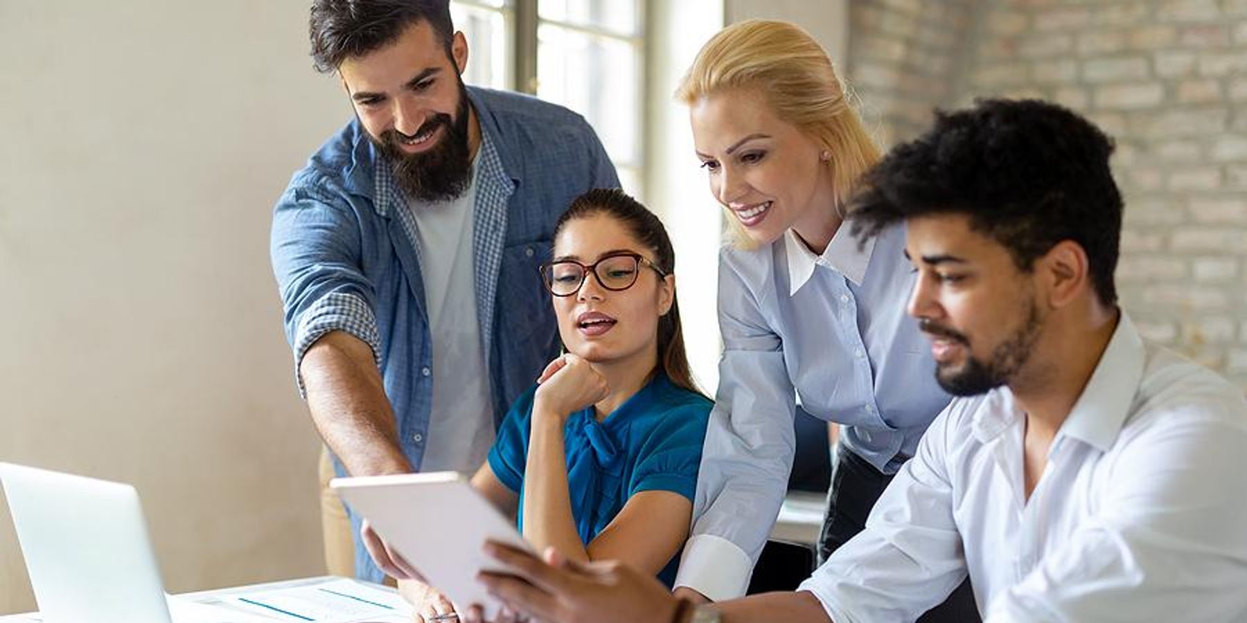 Coworkers collaborate on a work project