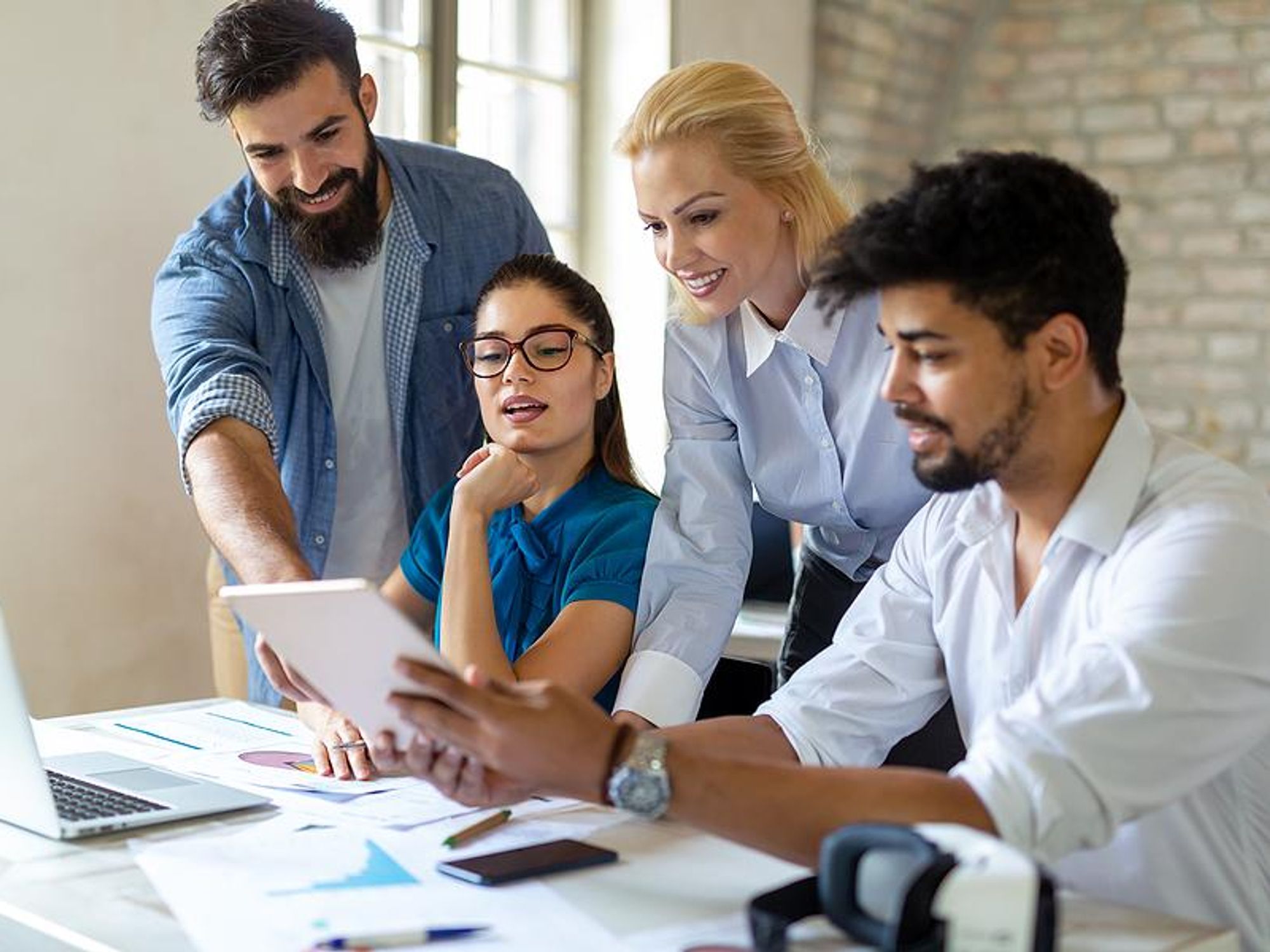 Coworkers collaborate on a work project