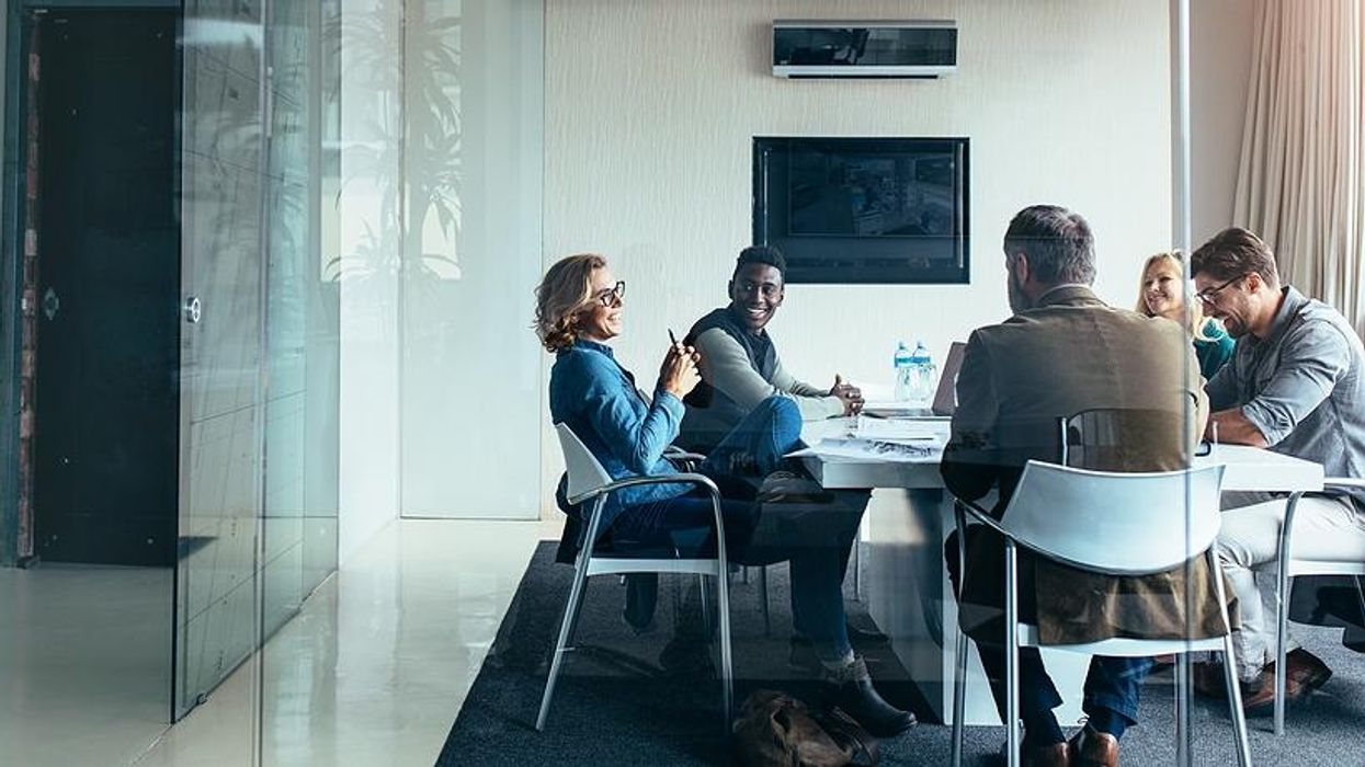 Coworkers have a team meeting