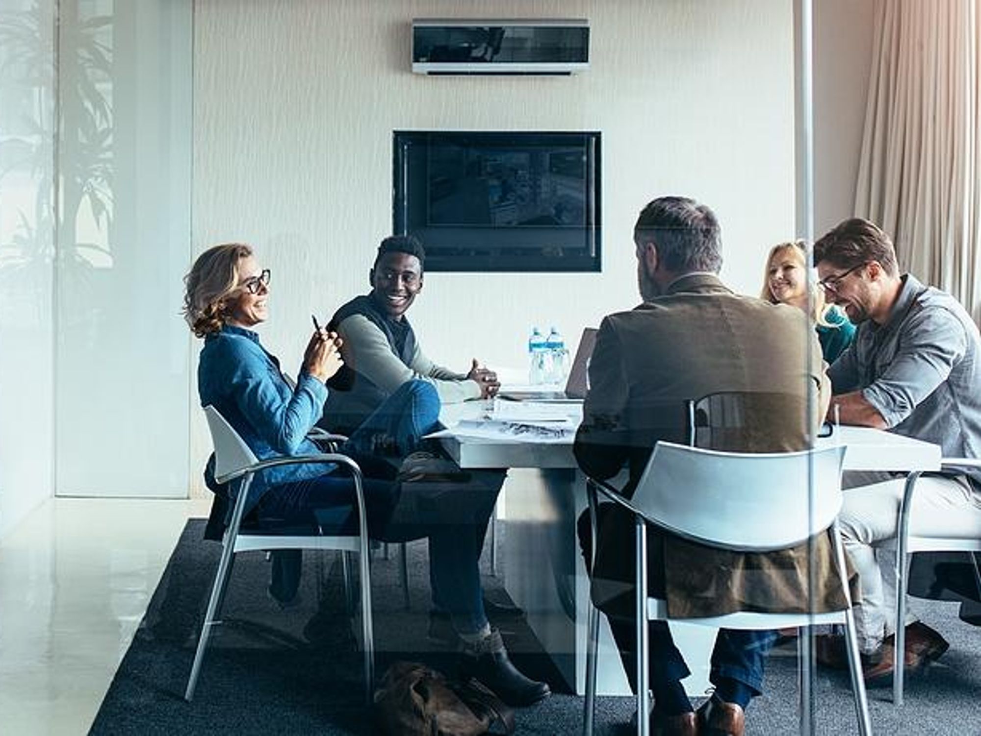 Coworkers have a team meeting