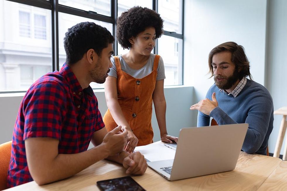 Coworkers meet about a project