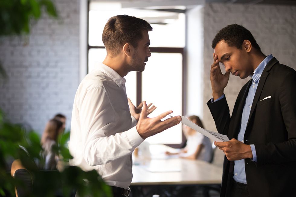 Coworkers talk/argue at work