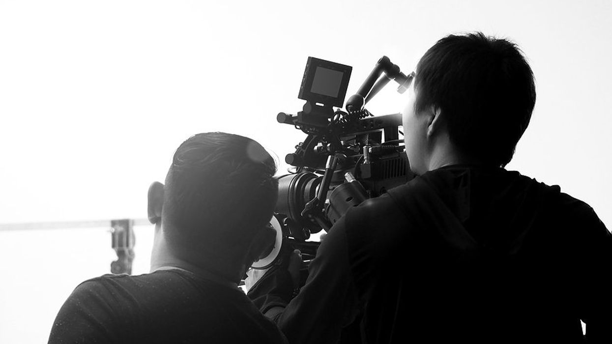 Creative professionals/filmmakers collaborate on a project