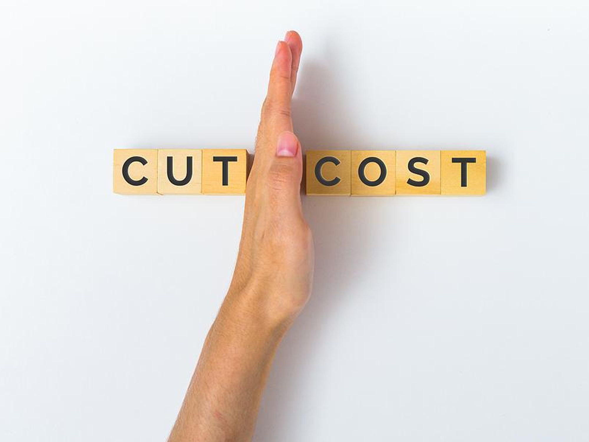 Cut costs, cost-cutting concept 
