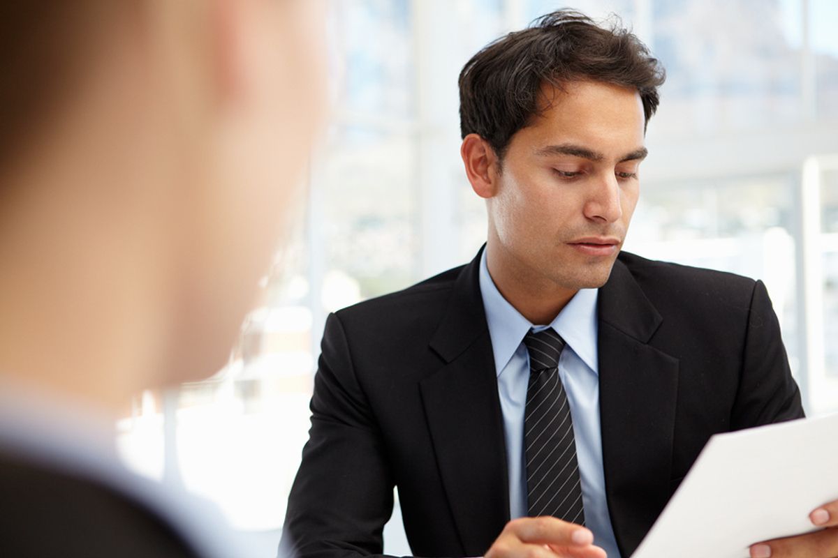Disappointed businessman reflects after being rejected for a job during an interview