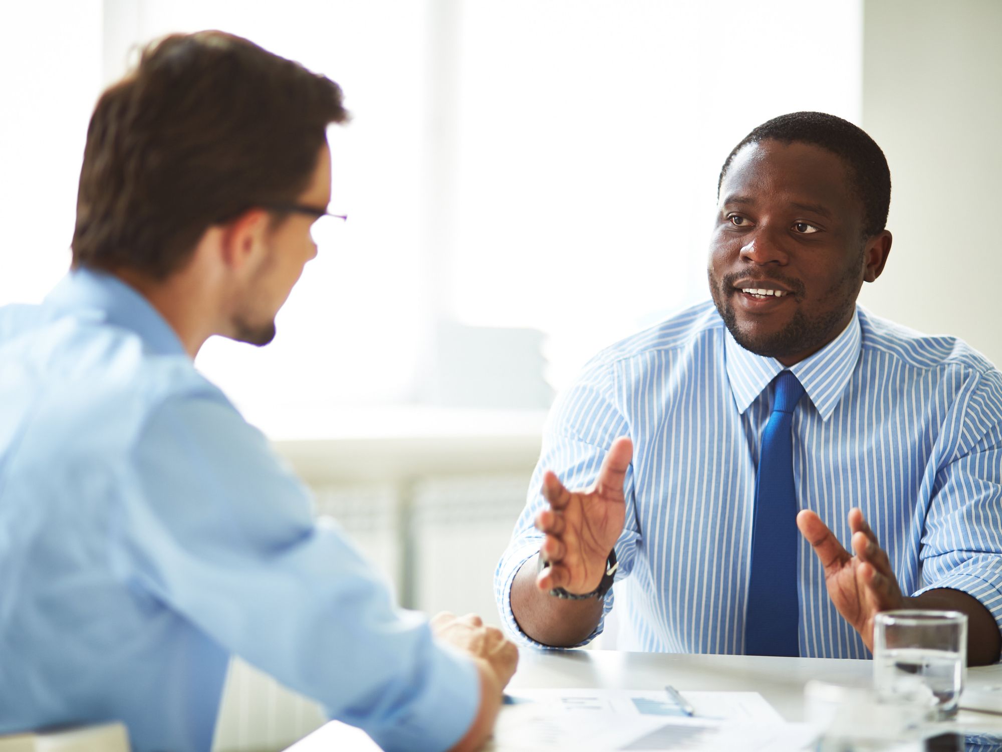 Employee asking for a job promotion after showing he's ready for more responsibility at work
