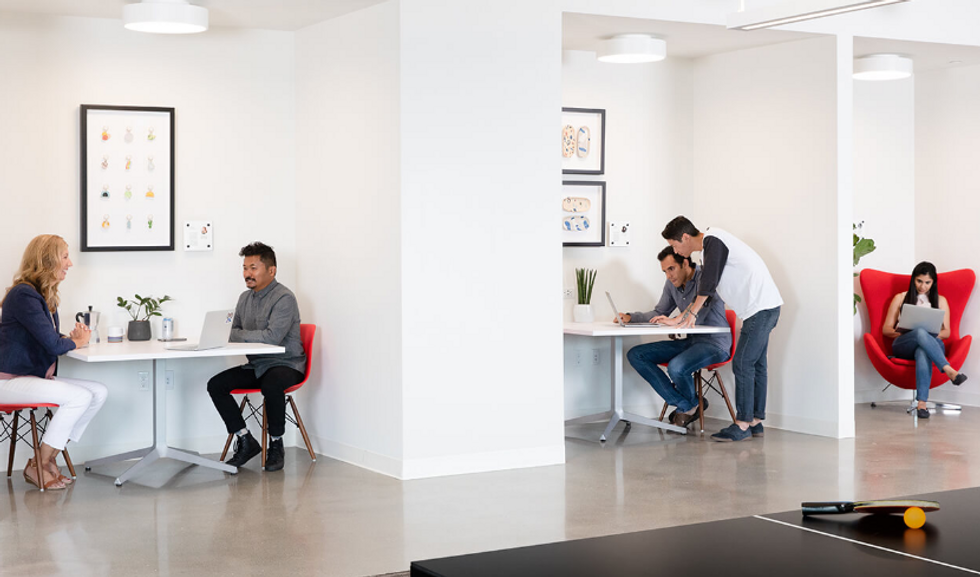 Employees collaborate at one of GoDaddy's many offices.
