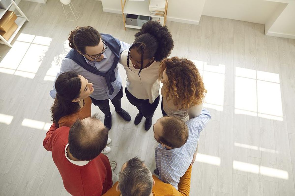 Employees doing a team-building activity at work