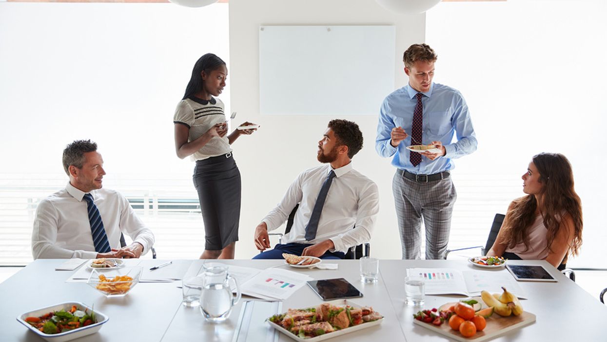 Employees with food allergies in the office eat lunch