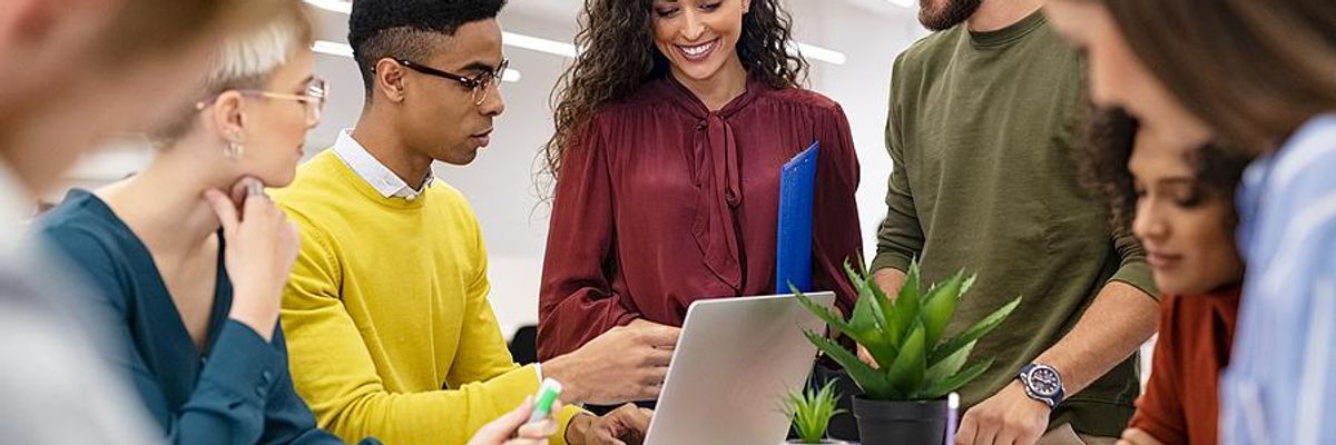Employees work together in the office