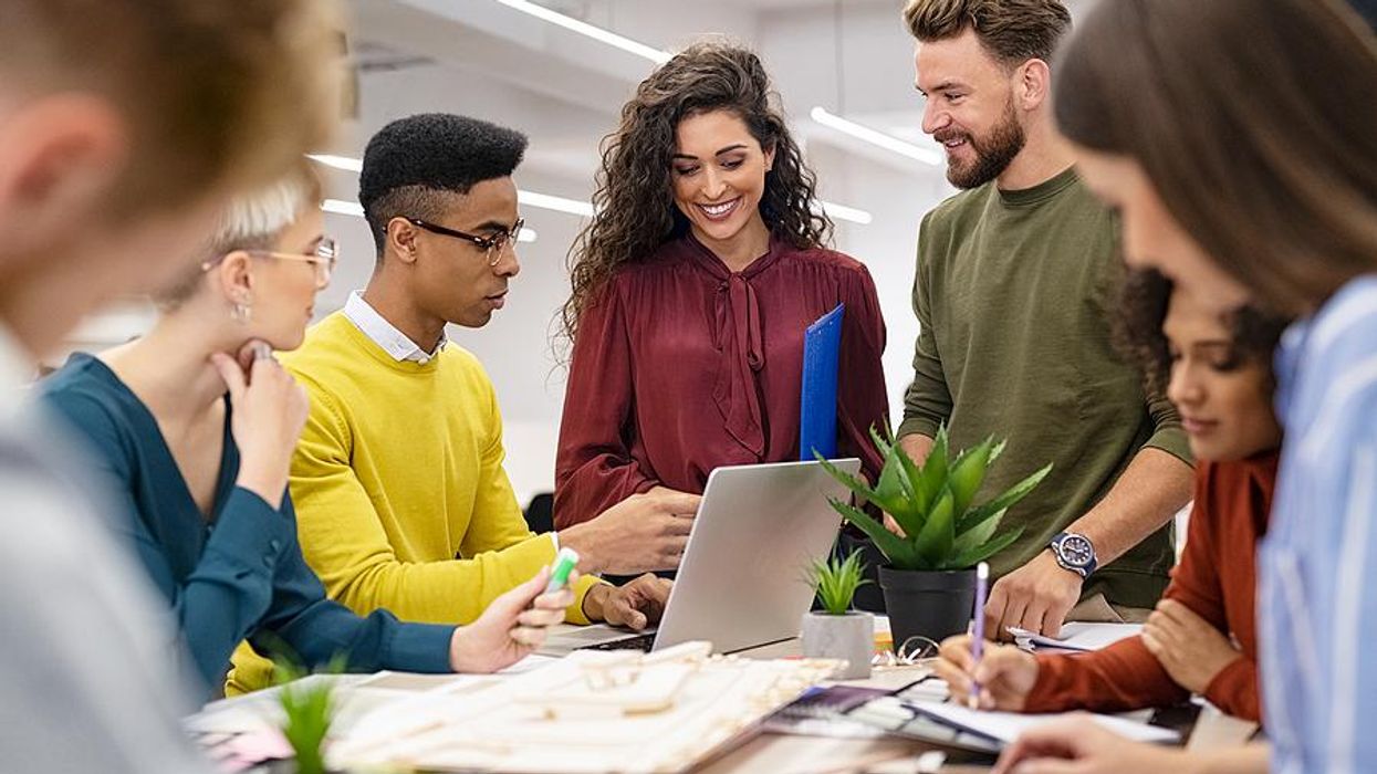 Employees work together in the office